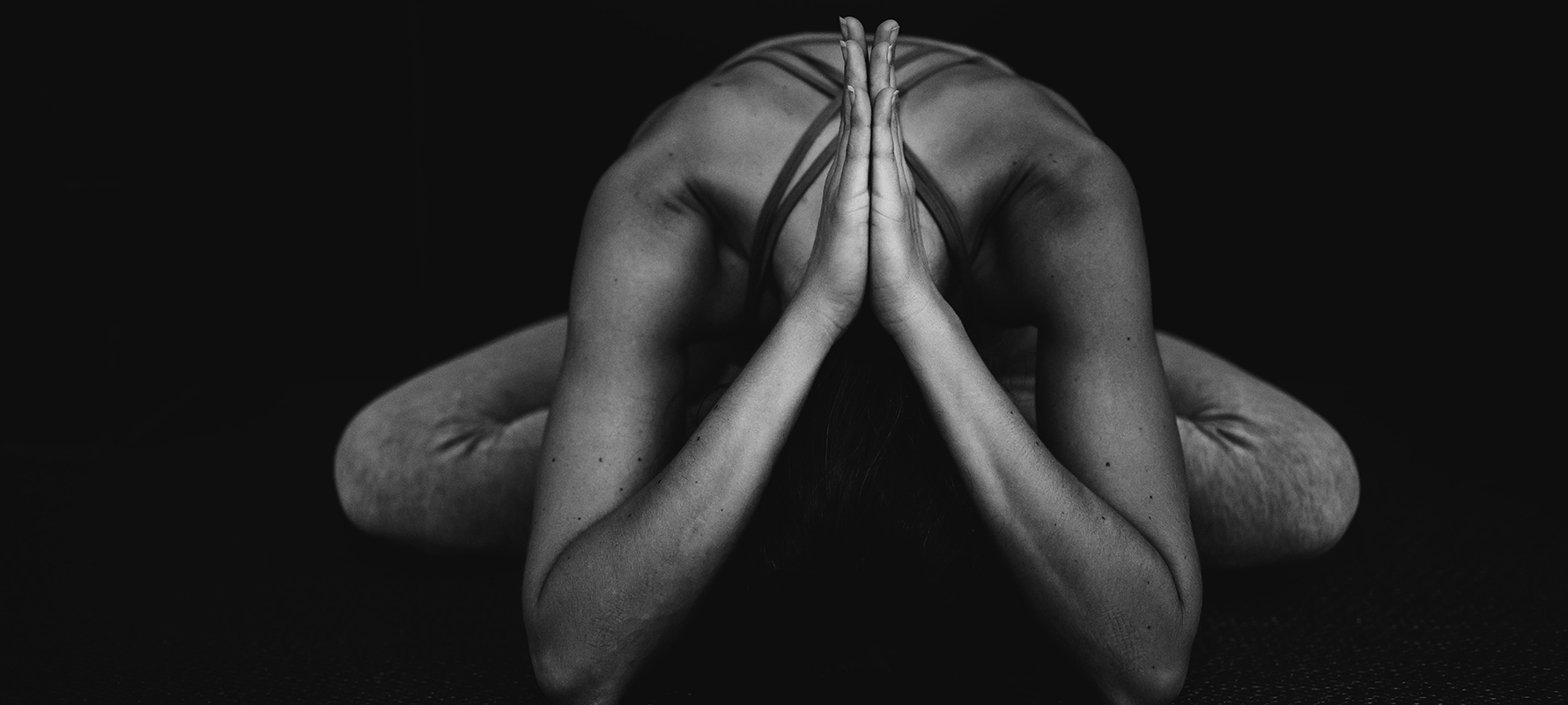 A woman performing a yoga pose.